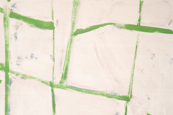 Abstract brush-stroked squares in green with a painterly background of blue speckles, creating a textured, layered effect on natural raffia wallpaper.