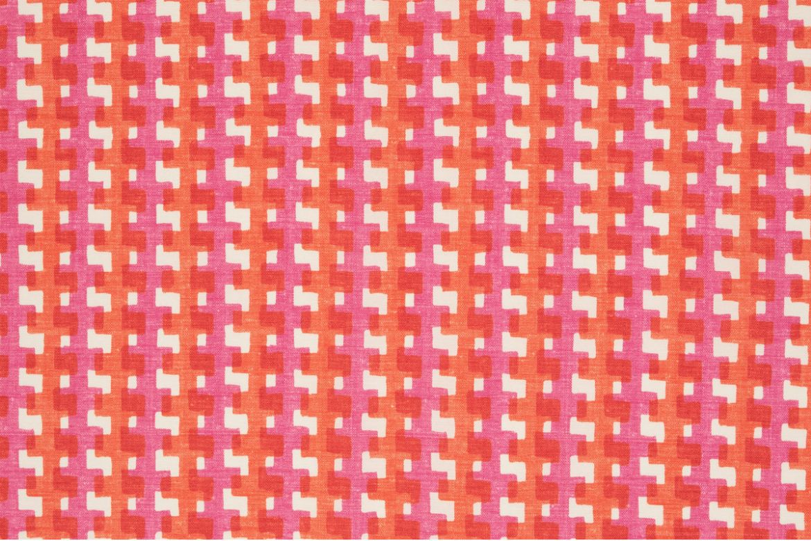 Cremaillère Printed Performance Fabric in Rosa, featuring a vibrant three-tone geometric pattern in hot pink, orange, and white.