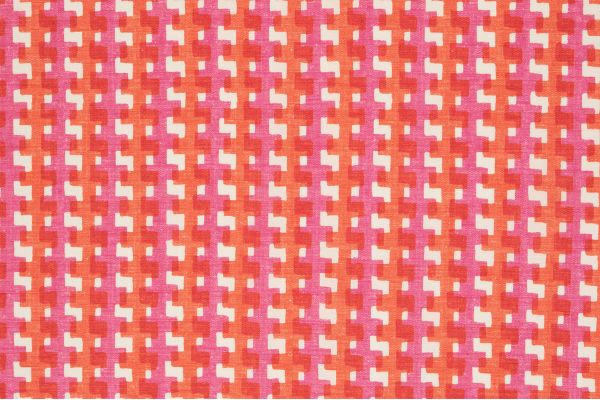 Cremaillère Printed Performance Fabric in Rosa, featuring a vibrant three-tone geometric pattern in hot pink, orange, and white.