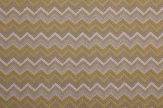 Kazulu Performance Fabric in D’oro—woven with warm gold and neutral tones in a linear zigzag pattern, offering a rich yet understated look.