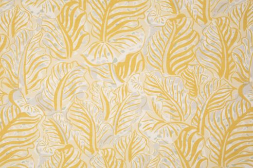 Mille Feuilles performance fabric in Limone, presenting vibrant leaf silhouettes in lemon yellow and white, adding a fresh, uplifting accent to outdoor and high-traffic interiors.