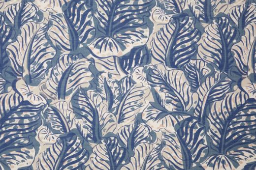 Mille Feuilles performance fabric in Blue, with bold, painterly leaf motifs in rich navy and soft cream, offering artistic flair with technical durability.