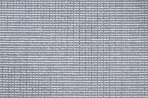 An outdoor, performance woven stripe in navy and white colours.