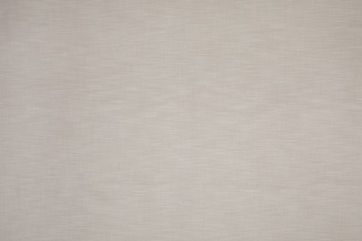 Maroma Perennials® Performance Fabric in Latte, a creamy neutral tone that complements patterned textiles with quiet sophistication.