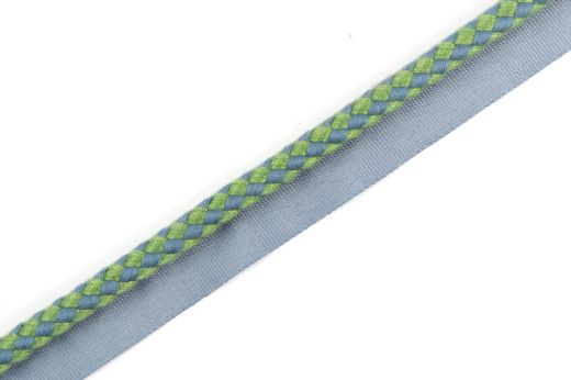 Circus Piping Trim in Green, featuring a lively two-tone check in green and blue, perfect for enhancing upholstery, drapery, and other interior details with a contemporary edge.