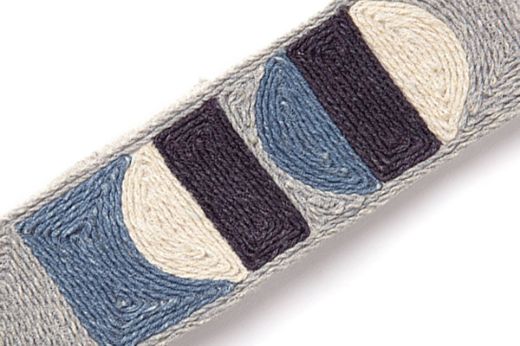 Pop Art Border Trim in Indigo – denim and navy blue geometric embroidery on ecru jute with grey-toned contrast stitching.