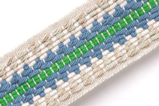 Railroad Border Trim in Green – stitched bands of green, turquoise, and pale blue form a rhythmic pattern.
