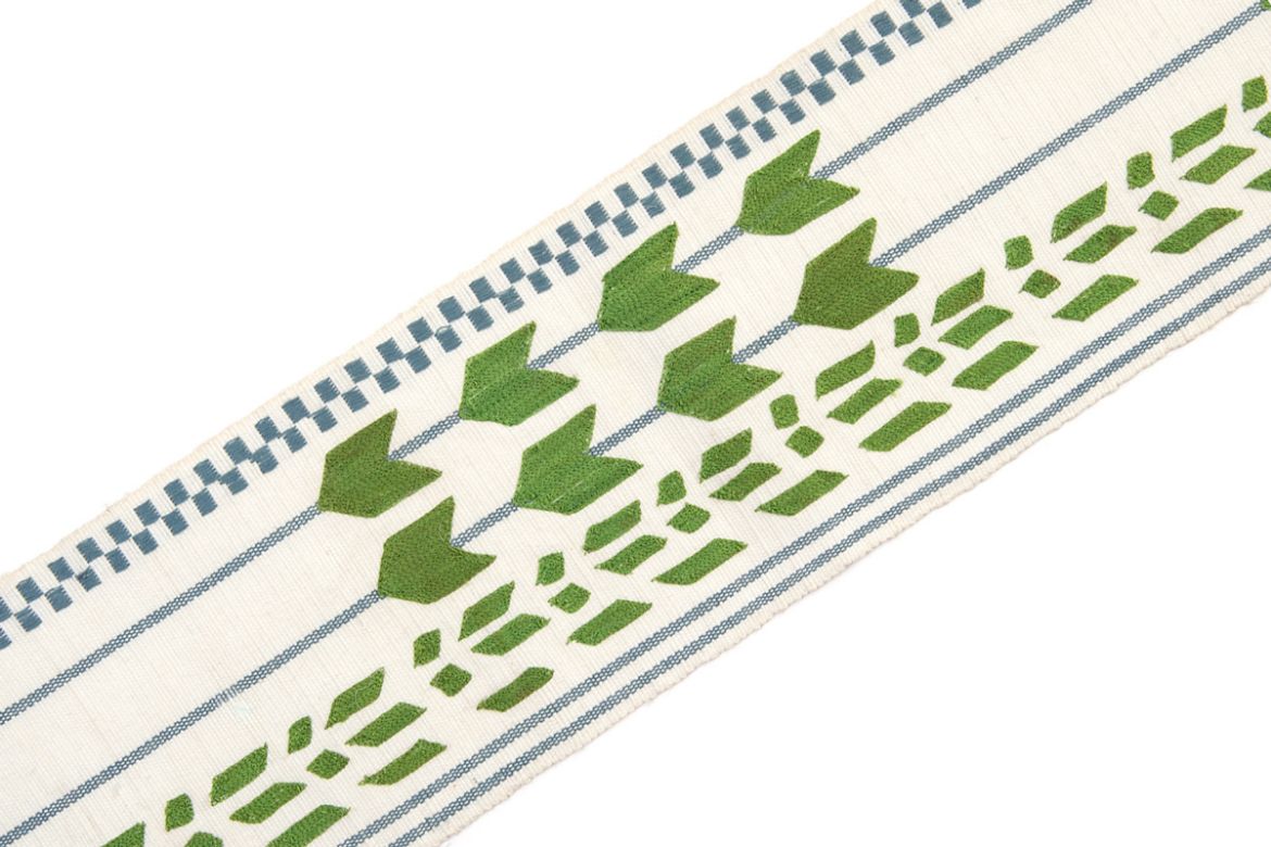 Geometric shapes in green with blue stripes going vertically and check at one side.
