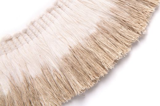 Natural linen fringe trim with neutral dip dye, blending into the pure, uncoloured texture of the handcrafted top of the trim.
