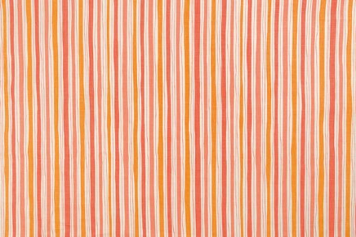 And Objects Boundary striped linen fabric in orange and coral hues, featuring a playful abstract stripe pattern, designed by And Objects for Christopher Farr Cloth.