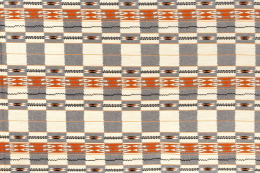 Chubby Check Woven Fabric in Grey, combining grey with orange, natural, and black checks. Ideal for modern upholstery, curtains, and stylish interior accents.
