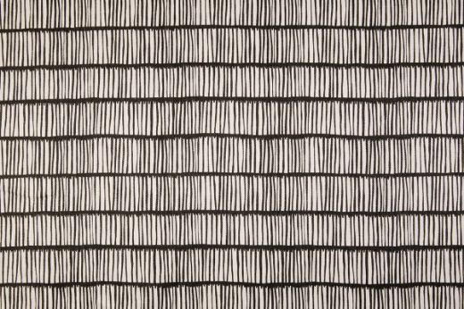 Crochet Printed Linen Fabric in Charcoal, a bold charcoal and white design with subtle texture and linear pattern, ideal for Scandi and minimalist interior schemes.