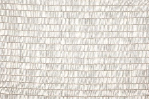 Crochet Printed Linen Fabric in Natural, a neutral linen and white mix with delicate linear pattern detail—perfect for layering texture in minimalist spaces.