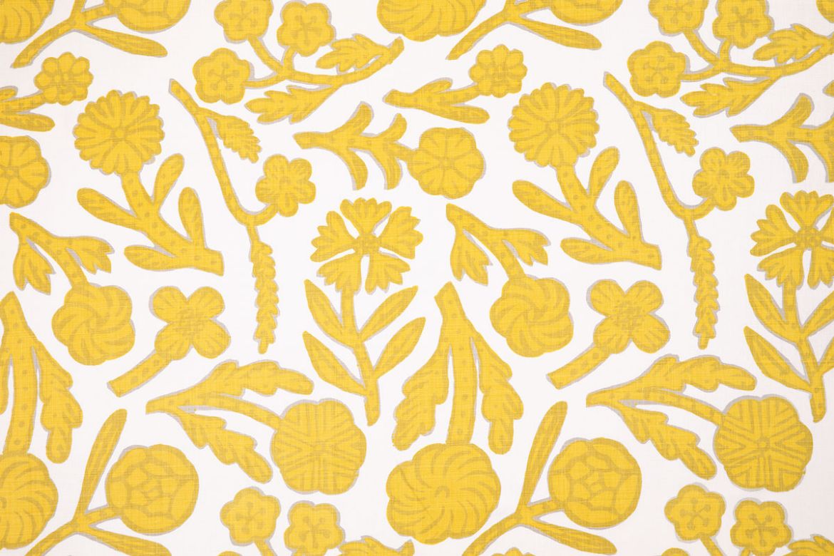 Day Printed Fabric in Lemon, featuring abstract hand-drawn floral motifs in vibrant yellow on white linen, creating a bold, painterly pattern for interiors.