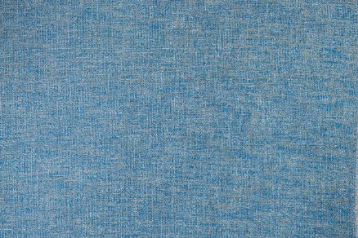 Denali Plain Woven Fabric in Denim, offering a cool, deep blue with a textured finish, perfect for creating a contemporary, grounded look in any space.