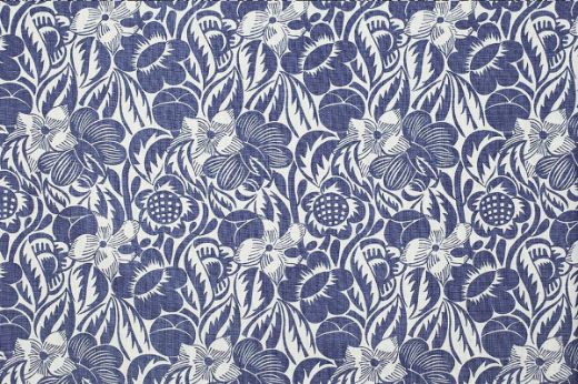 Decorative linen fabric in rich indigo blue featuring expressive floral motifs from the Raoul Dufy archive, reimagined by Christopher Farr Cloth.