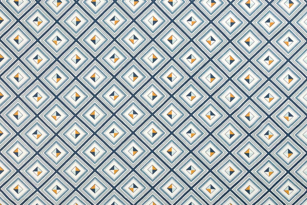 Bold geometric fabric in deep indigo with layered diamonds and vibrant stripes, designed by AND Objects for Christopher Farr Cloth.