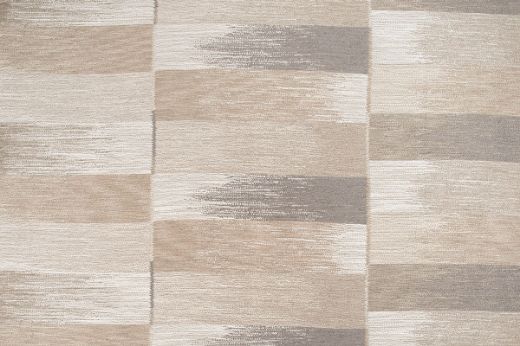 Subtle Natural Ikat Weave Fabric, featuring a mix of neutral tones that create an elegant, understated design perfect for versatile interiors.