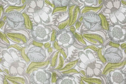 La Forêt Printed Fabric in Smoke—soft lime green and grey tones combine in a painterly floral print, creating a calm, modern atmosphere.