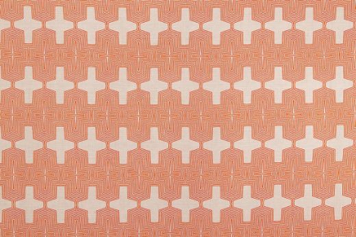 Laguna Printed Fabric in Orange – striking geometric design in vivid orange tones printed on natural linen background.