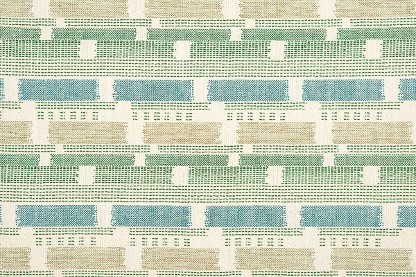 Loom Weave woven fabric in Green, blending blue, green, and natural hues. A dynamic pattern with cultivated colour and design-led texture.