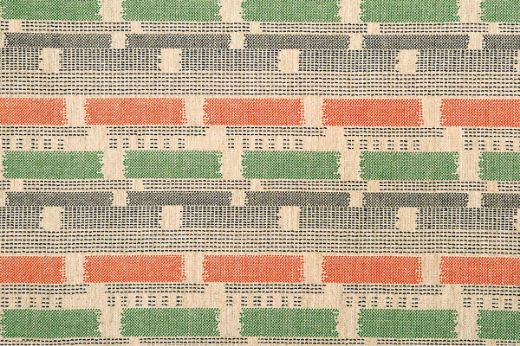 Loom Weave woven fabric in Orange, showcasing orange, green, grey, and natural shades. A tactile, rhythmic weave inspired by modernist craftsmanship.