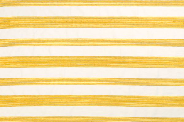 Nomad Woven Fabric in Lemon – wide-stripe design in soft yellow and natural tones, ideal for upholstery, blinds, and tailored soft furnishings.
