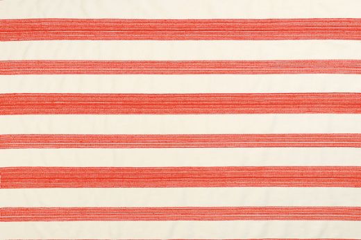 Nomad Woven Fabric in Coral – a bold stripe weave featuring warm coral and natural hues for vibrant yet balanced interiors.