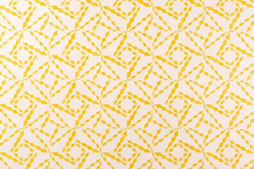 Lemon – Interlocking diamond lines in soft lemon yellow over a natural woven linen ground, creating a light and lively geometric effect.