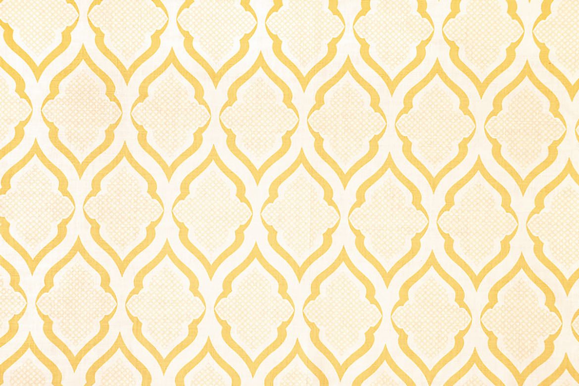 Ravenna Printed Fabric in Lemon – a vibrant geometric print in soft yellow on natural linen, designed by Michael Szell for a fresh, sunlit interior accent.