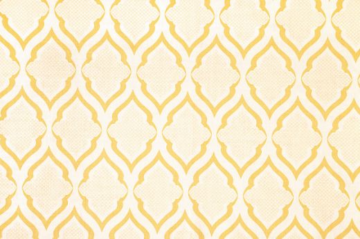 Ravenna Printed Fabric in Lemon – a vibrant geometric print in soft yellow on natural linen, designed by Michael Szell for a fresh, sunlit interior accent.