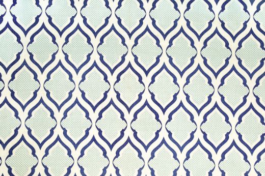 Ravenna Printed Fabric in Indigo – navy and ecru lines form a structured, architectural print on linen, ideal for bold yet timeless design schemes.