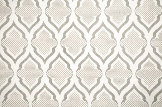 Ravenna Printed Fabric in Smoke – soft grey tones in a repeating geometric motif offer a subtle, textural elegance for understated luxury interiors.