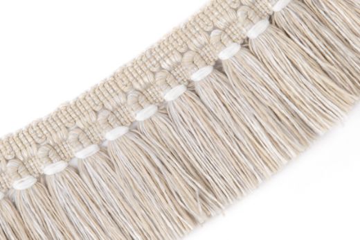 Warm beige Hula Fringe Performance Trim with delicate cream accents, exuding a cozy and inviting feel.