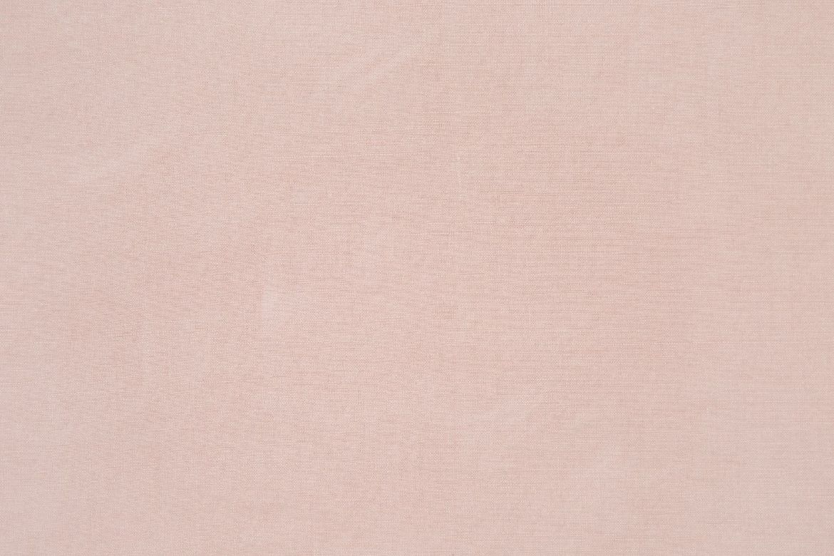 Rose – Pebble Woven Fabric in rose, a soft blush pink textured weave with an organic surface inspired by natural stone