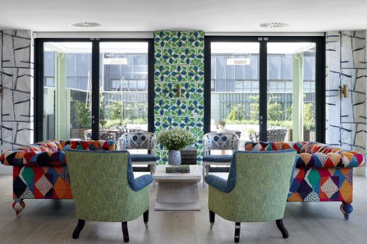 Fiori grass wallpaper by Sandra Blow. Interior by Kit Kemp at Richmond Building Firmdale Hotels. Photography by Simon Brown