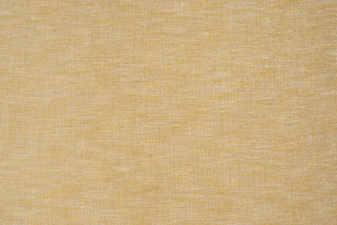 Denali Plain Woven Fabric in Lemon, featuring a rich, textured weave in an earthy yellow hue, bringing warmth and depth to any interior.