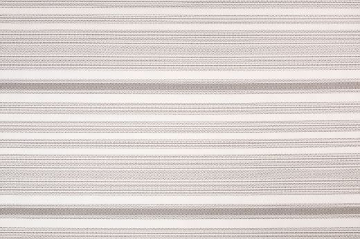 Saint Tropez Outdoor Woven Fabric in Sabbia – warm sand tones with a delicate woven stripe, ideal for creating an inviting outdoor setting.