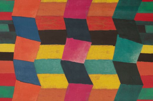 Bright colourful geometric blocks fit together to create a zig zag pattern in pinks, yellow, greens and blues.