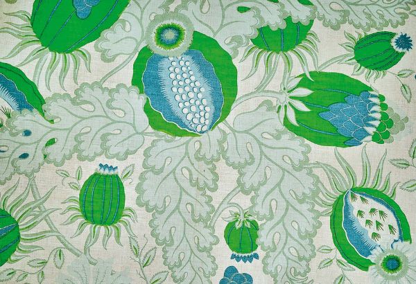 Christopher Farr Cloth Carnival Indoor Print Green. A detailed botanical illustration featuring large stylised flowers in shades of green, beige and blue, with intricate leaves and stems on a light background. 