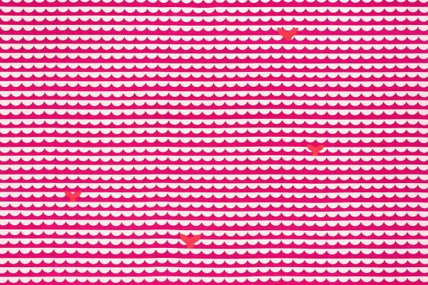 Pink and white scallop wave pattern with orange whale tails.