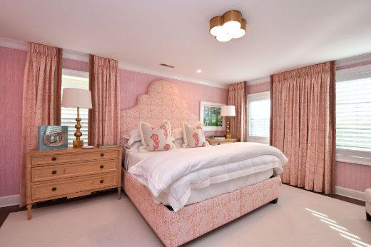 Christopher Farr Cloth Punch Paisley Peach bed Trapeze cushion & Downey Fuchsia wallpaper Patty Babcox from Babcox Design Photography by Tom Gron - Pink bedroom