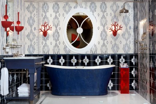 Travelling light cobalt wallpaper by Kit Kemp. Interior by Kit Kemp at C.P Hart Bathroom in Waterloo showroom. Photography by Milo Brown.