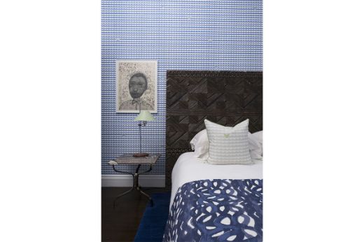 We Sailed Away cobalt wallpaper with two ‘ We Sailed Away ’ pale blue cushions by Donna Wilson / Fogo Island Collection . Photography by Antonia Blunt