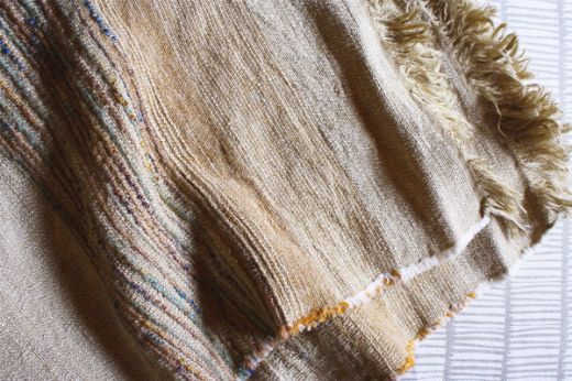 Textured woven throw natural with blue orange purple thread tones christopher farr cloth