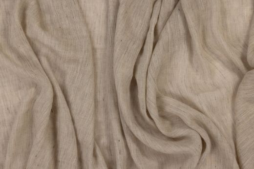 Midori sheer fabric in Natural – close-up scrunched view highlighting lightweight texture and tonal speckling in natural hues.
