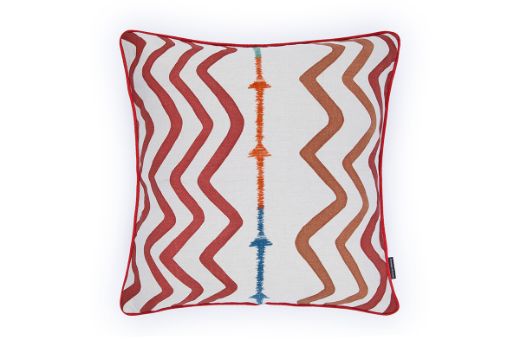 Front view of Rick Rack cushion in terracotta, showcasing Kit Kemp’s embroidered arrow design on linen with flowing, tactile detail and bold terracotta tones.